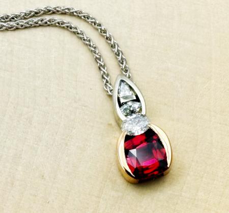 18 karat white and rose gold 1.10 carat vibrant red ruby and diamond necklace. $6,950.00
