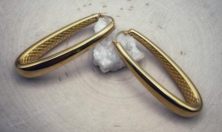 Sterling silver 22 karat yellow gold vermeil long oval hoops. $200.00