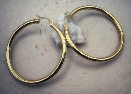 Sterling silver 22 karat yellow gold vermeil 3mm x 40mm large hoops. $155.00