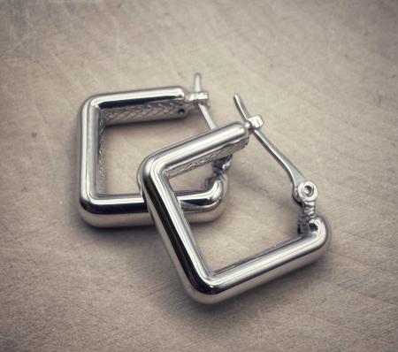 Sterling silver square hoops. $103.00
