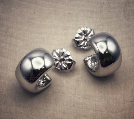 Sterling silver 10mm wide hoops. $82.00