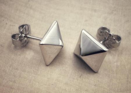Sterling silver pyramid studs. $54.00