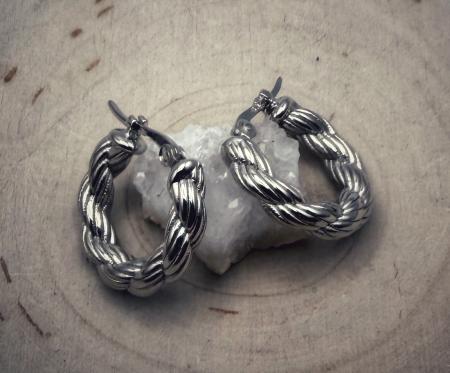 Sterling silver rope style hoop earrings. $117.00