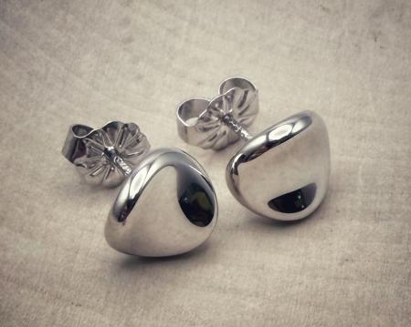 Sterling silver concave button earrings. $75.00