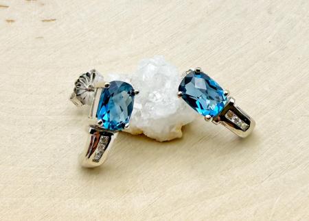 14 karat white gold London blue topaz and diamond earrings. $975.00