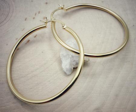 14 karat yellow gold 39mm x 2mm hoop earrings. $695.00