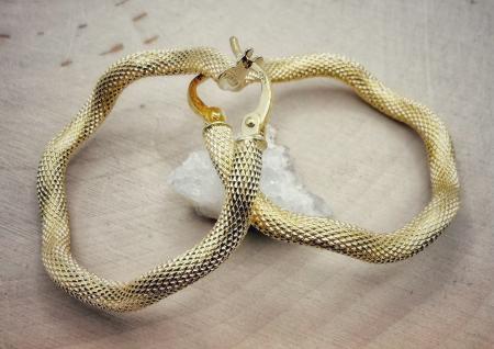 14 karat yellow gold 28mm x 3mm textured wave hoop earrings. $1050.00