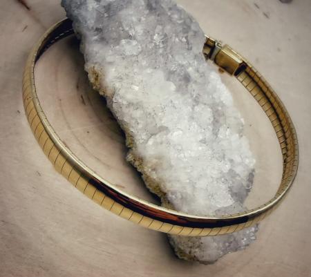 14 karat yellow gold 6mm wide omega bracelet. $2995.00