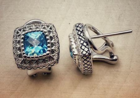 Sterling silver and cushion checkerboard cut Swiss blue topaz earrings. $275.00 