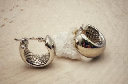 Sterling silver 15mm wide huggie hoops. $97.00