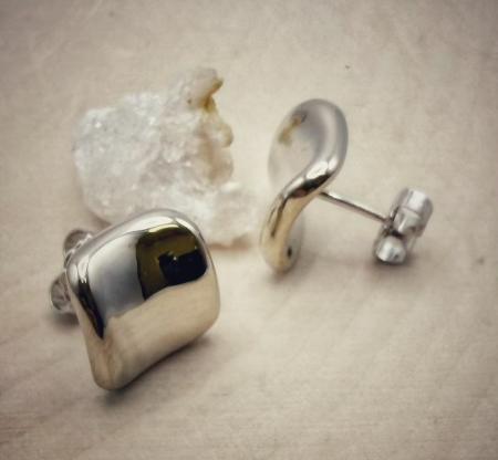 Sterling silver concave puffed square stud earrings. $95.00