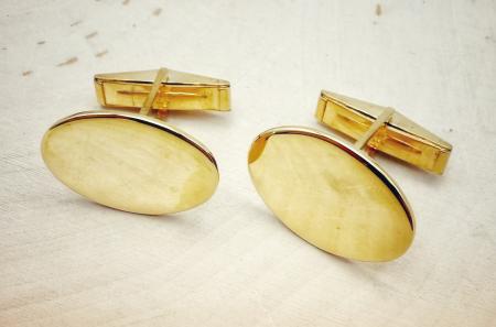 14 karat yellow gold oval cuff links. $2375.00
