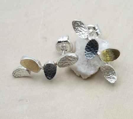 Oxidized sterling silver and 18 karat gold vermeil pedal petal design earrings. $390.00