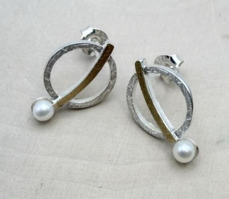 Sterling silver and 18 karat gold vermeil freshwater cultured pearl circle earrings. $402.00