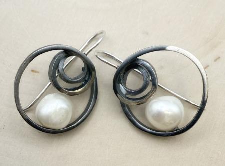 Oxidized sterling silver and freshwater cultured pearl earrings. $636.00