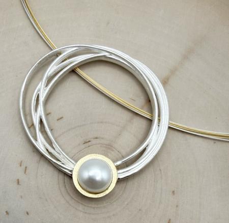 Sterling silver and 18 karat gold vermeil freshwater cultured pearl large nest design necklace. $1225.00