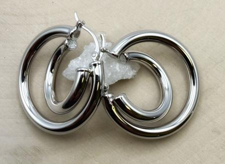 Sterling silver double hoop earrings. $160.00