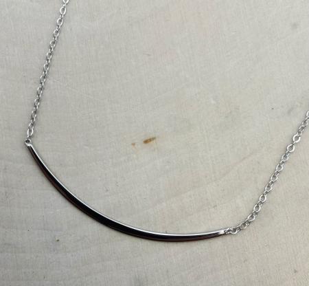 Sterling silver curved bar necklace. $105.00