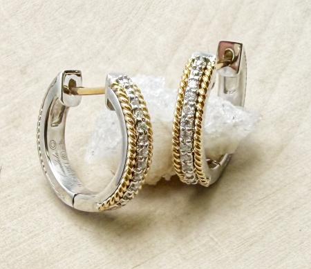 Sterling silver and 18 karat yellow gold diamond huggie hoops. $550.00