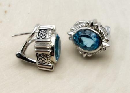 Sterling silver and oval Swiss blue topaz earrings. $400.00