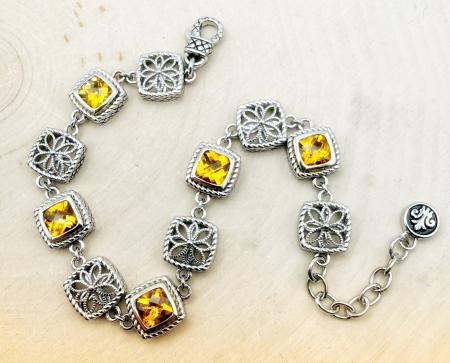 Sterling silver and checkerboard cushion cut citrine bracelet. $650.00