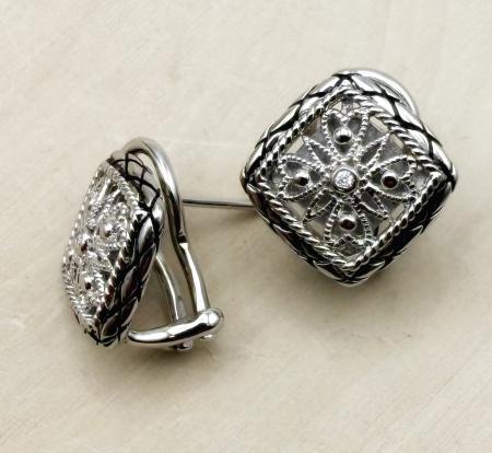 Sterling silver square filigree earrings with a diamond accent. $150.00
