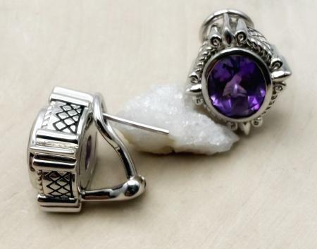 Sterling silver and oval faceted amethyst earrings. $400.00