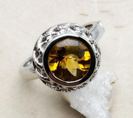 Sterling silver and round checkerboard cut citrine ring. $150.00