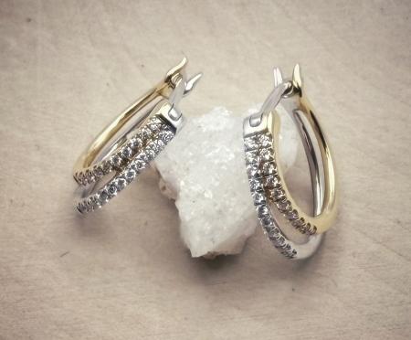 14 karat yellow and white gold double hoop earrings. $1920.00
