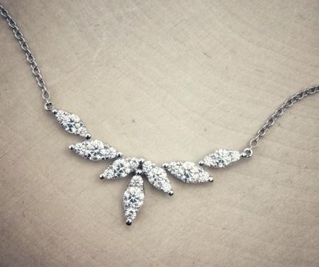 14 karat white gold diamond "spray" necklace. $4080.00
