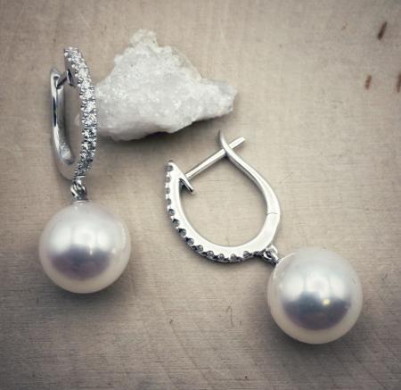 14 karat white gold 8.5-9mm cultured pearl and diamond earrings. $2490.00