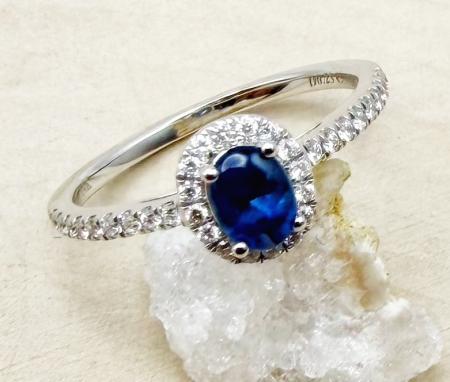 14 karat white gold cabochon cut blue sapphire and diamond ring. $1935.00