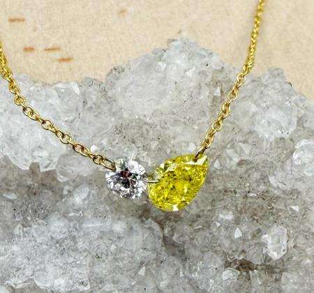 14 karat yellow gold fancy yellow and colorless lab diamond necklace. 0.88 carat total weight. $2325.00