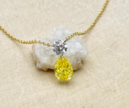 14 karat yellow gold fancy yellow and colorless lab diamond necklace. 1.01 carat total weight. $2505.00