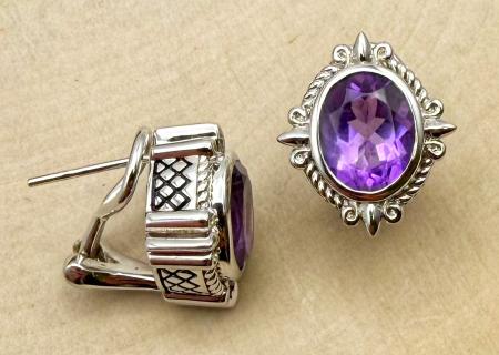 Sterling silver and oval faceted amethyst earrings. $400.00